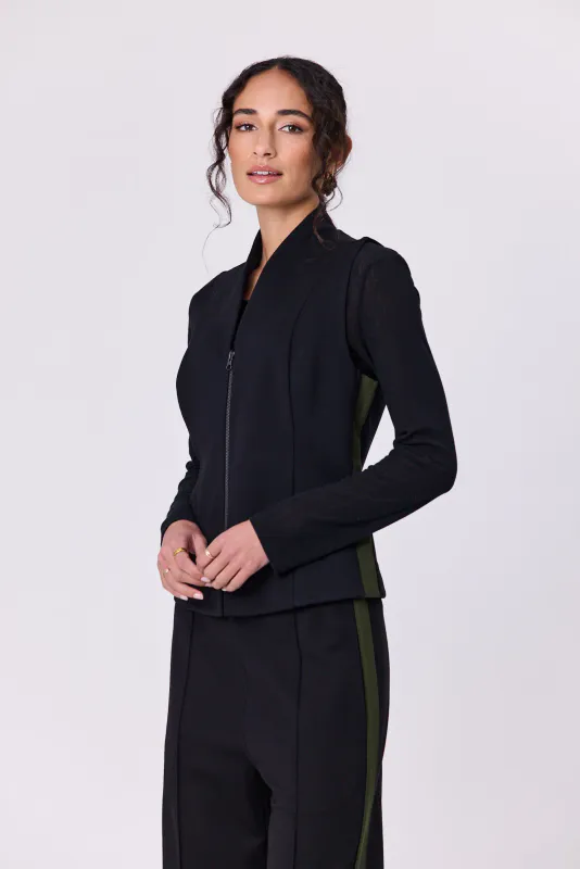 Model wearing Black Olive Batten Vest By Navy & Co. Available at Beetees Nelson