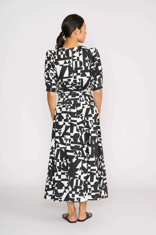 Model wearing Abstract Top - Swing, Volume Sleeve By Foil Available at Beetees Nelson