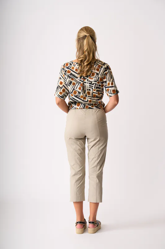 Model wearing Toffee Maze Pleat Back Top By Foil Available at Beetees Nelson