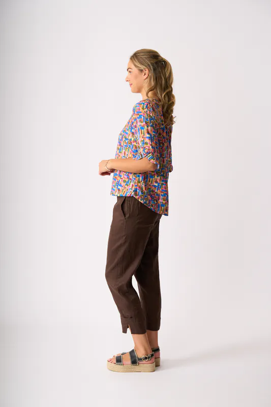 Model wearing Dashed Out Ruffle Sleeve Scoop Top By Foil Available at Beetees Nelson