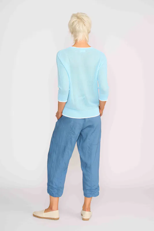 Model wearing Ice Blue & White Contrast Edge Jumper By OH Three Available at Beetees Nelson