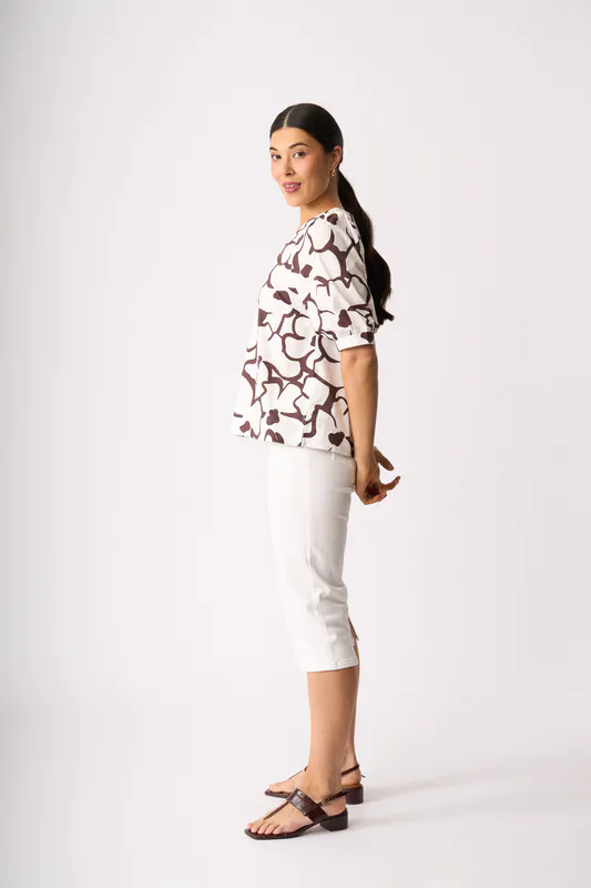 Model wearing Upsa-Daisy Scoop Neck Swing Top By Foil Available at Beetees Nelson
