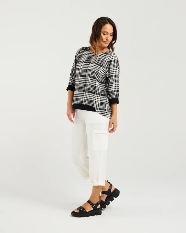 Model wearing Black Check Taylor Top By Seduce Available at Beetees Nelson
