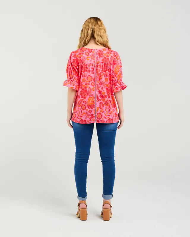 Model wearing Abstract Blush Sadie Top By Seduce Available at Beetees Nelson