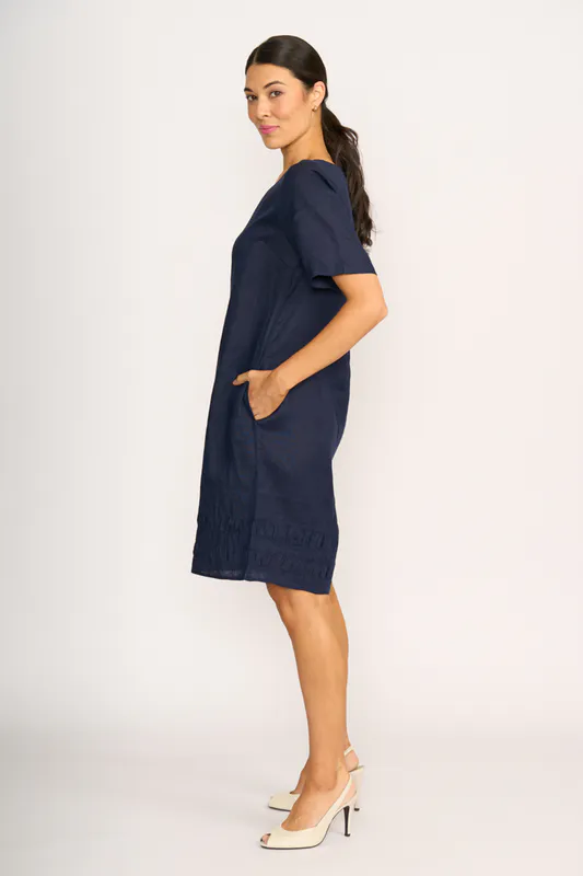 Model wearing Navy Crowd Pleaser Dress By Foil Available at Beetees Nelson