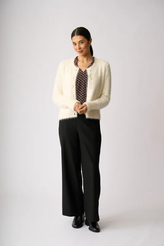 Model wearing Vanilla Fluffy Scoop Cardigan By Foil Available at Beetees Nelson