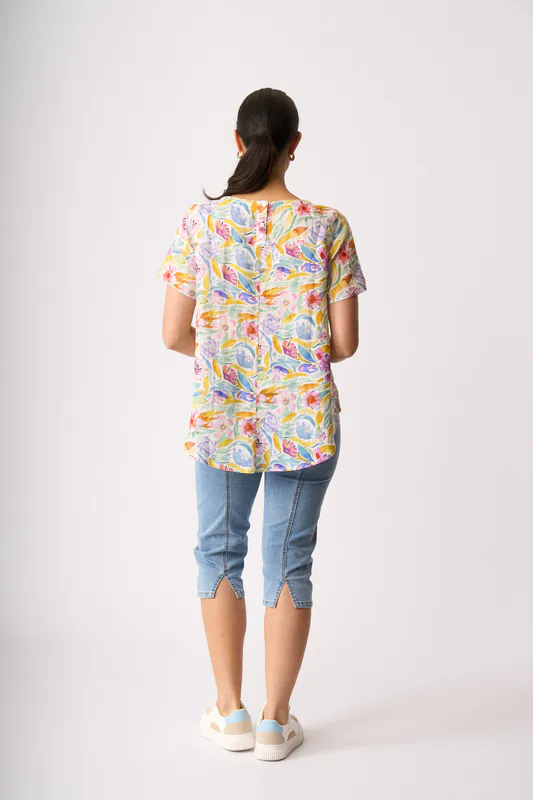 Model wearing Bright Blooms Top - Swing, Up Down Hem By Preen Available at Beetees Nelson