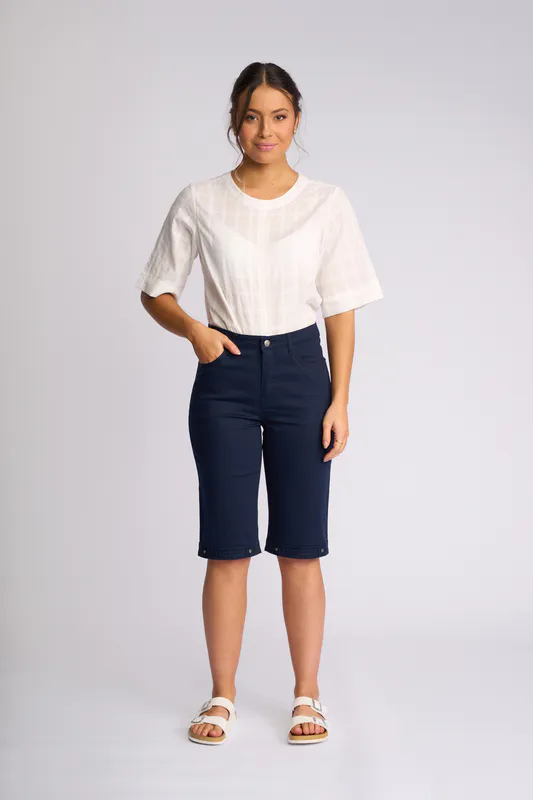 Model wearing Navy Custom Poplin Short By Vassalli Available at Beetees Nelson