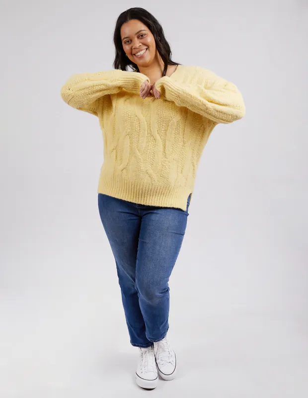 Model wearing Yellow Tallulah Cable Women's Knit By Elm Available at Beetees Nelson