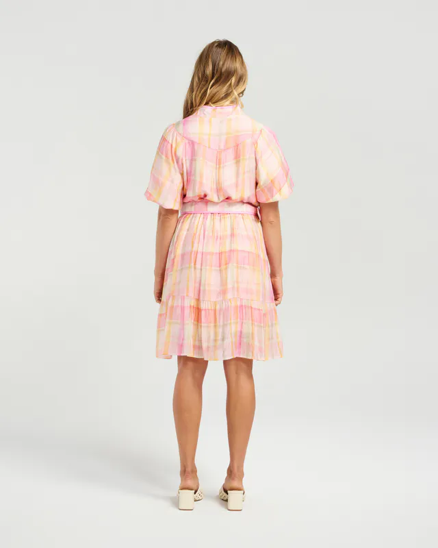 Model wearing Sunset Blush Addie Dress By NMBR Rose Available at Beetees Nelson
