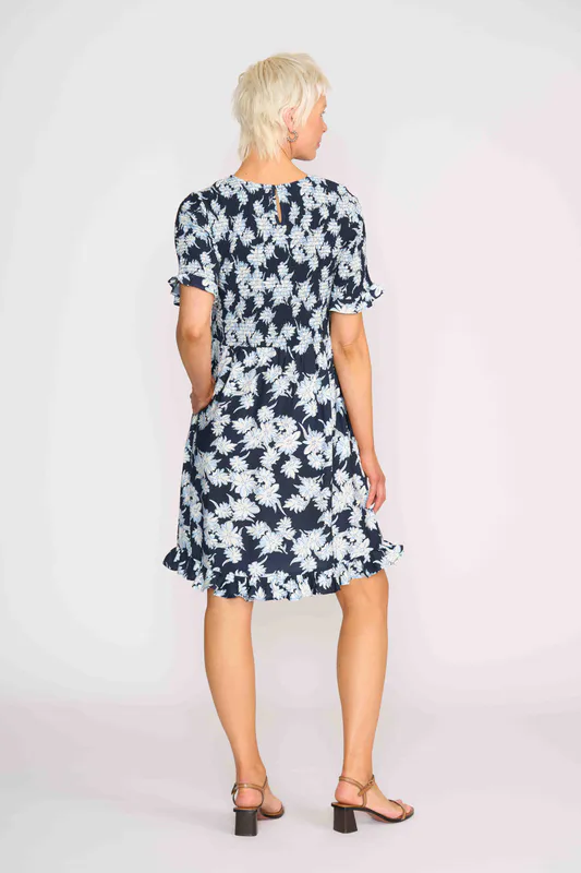 Model wearing Navy Sketch Floral Shirred Body And Sleeve Dress By Foil Available at Beetees Nelson