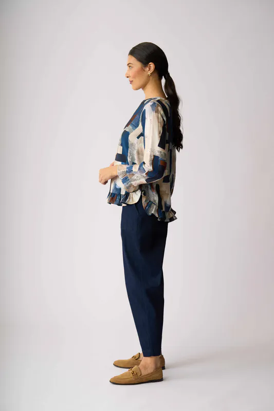 Model wearing Modern Art Gathered Scoop Hem Top By Preen Available at Beetees Nelson