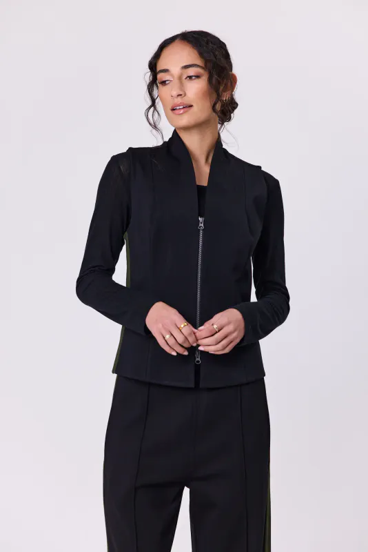 Model wearing Black Olive Batten Vest By Navy & Co. Available at Beetees Nelson