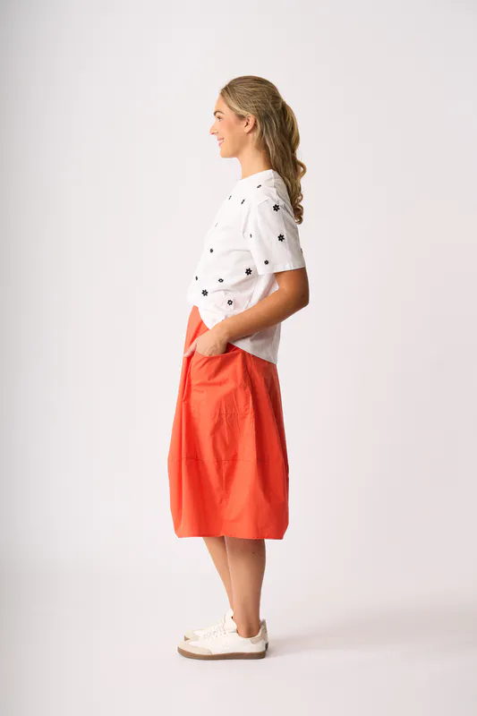Model wearing White Floral Embroidered Fun Tshirt By Memo Available at Beetees Nelson