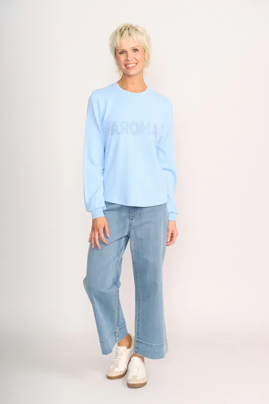 Model wearing Sky Aroha Sweater - Wander By Memo Available at Beetees Nelson