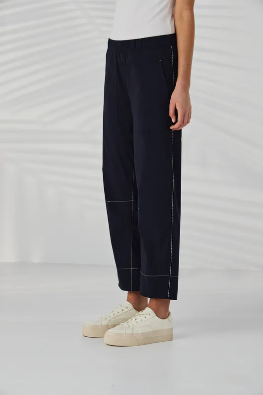 Model wearing Navy Trader Pant By Lania Available at Beetees Nelson