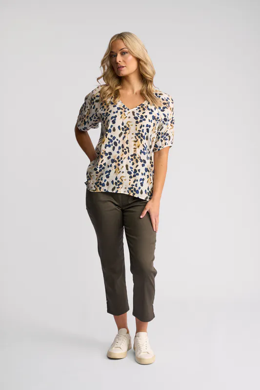 Model wearing Aurora Pitch Top By Vassalli Available at Beetees Nelson