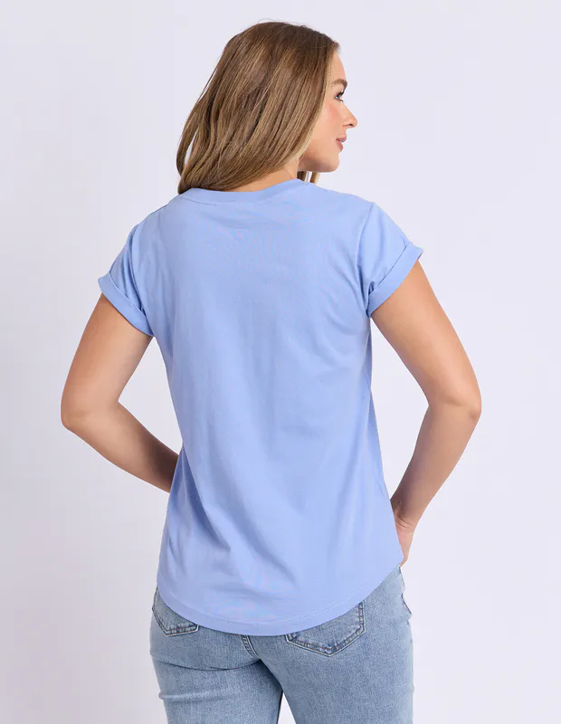 Model wearing Cornflower Blue Effortless Contrast Tee By Foxwood Available at Beetees Nelson