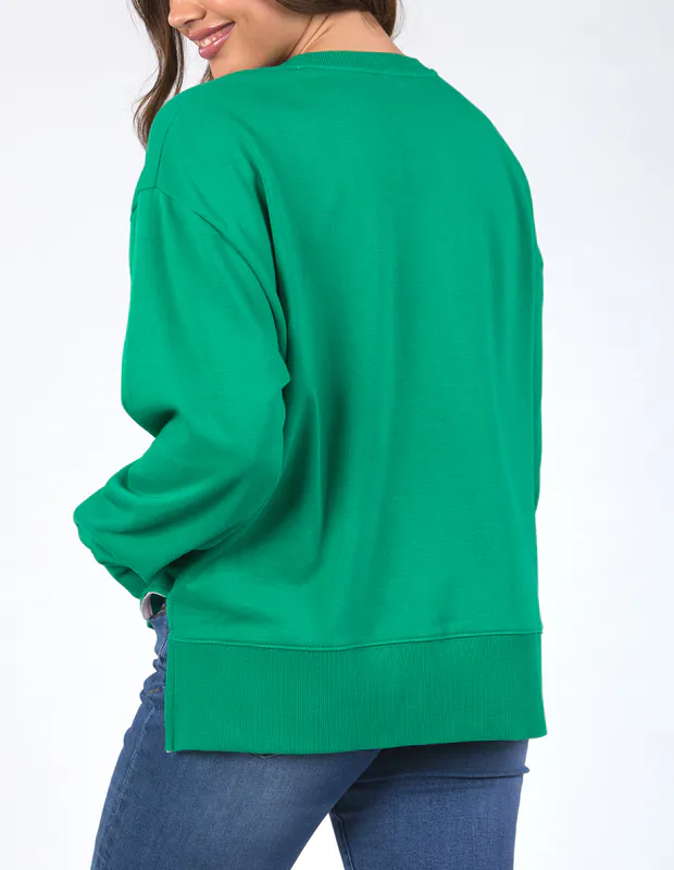 Model wearing Pine Green Madeleine Stamer II Crew By Elm Available at Beetees Nelson