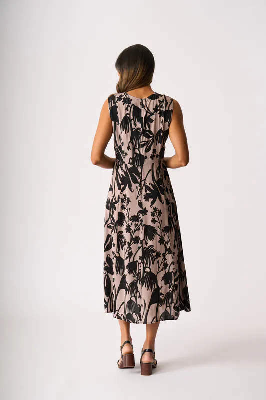 Model wearing Shadow Frond Panel Flare Dress By Foil Available at Beetees Nelson