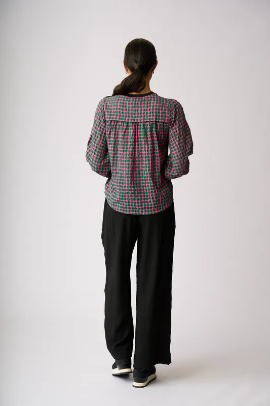 Model wearing Pink Spot Contrast Woven Top By Memo Available at Beetees Nelson