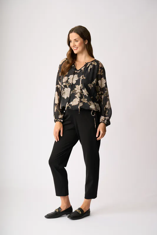 Model wearing Classic Bloom Drawcord Hem Blouse By Memo Available at Beetees Nelson