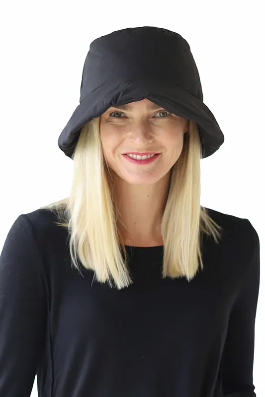 Model wearing Puffer Hat By Archer House Available at Beetees Nelson