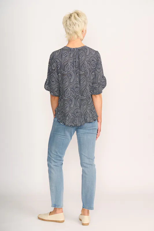 Model wearing Midnight Stars Ruffle Sleeve Top By Foil Available at Beetees Nelson