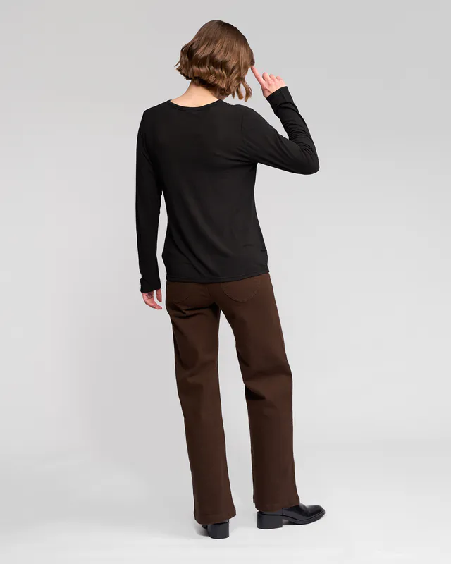 Model wearing Black Layer Top By Vassalli Available at Beetees Nelson