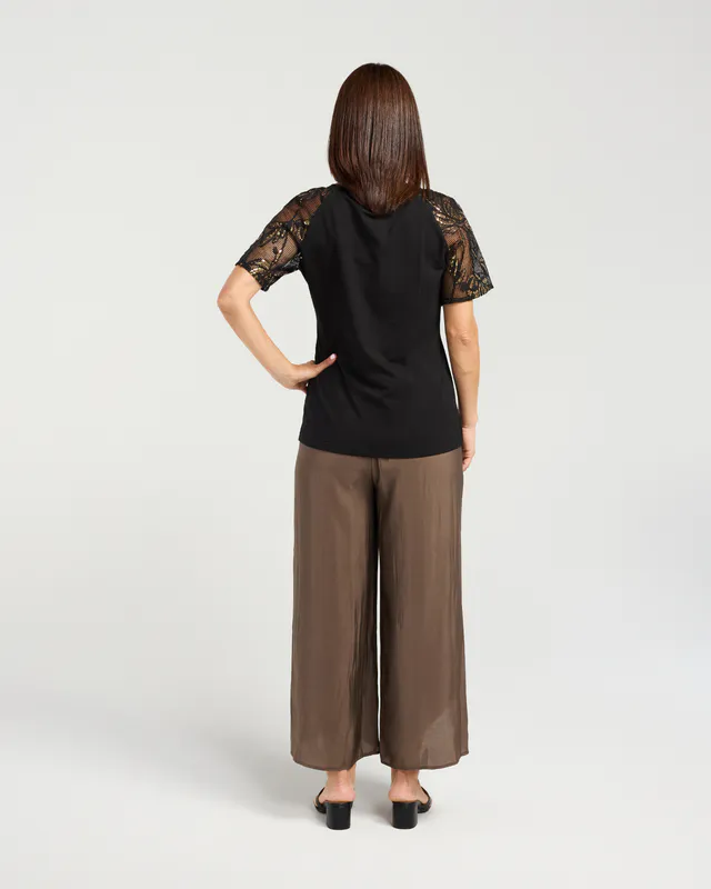 Model wearing Black Selah Top By Seduce Available at Beetees Nelson