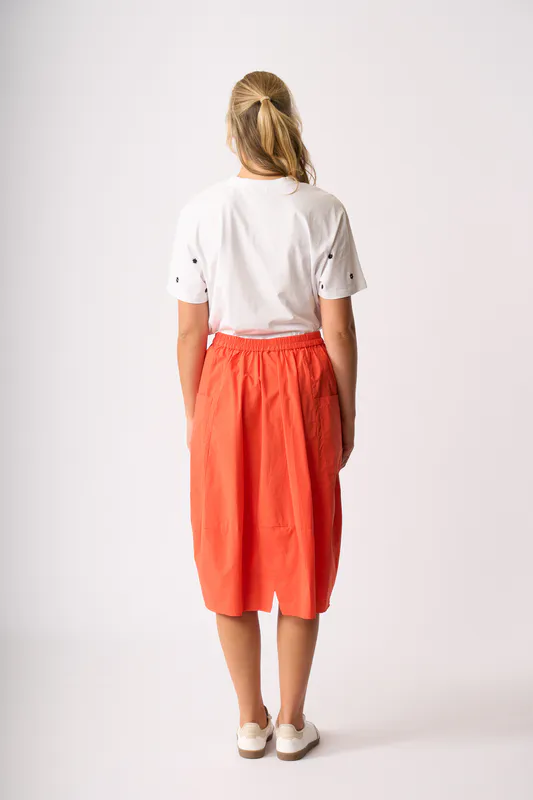 Model wearing White Floral Embroidered Fun Tshirt By Memo Available at Beetees Nelson