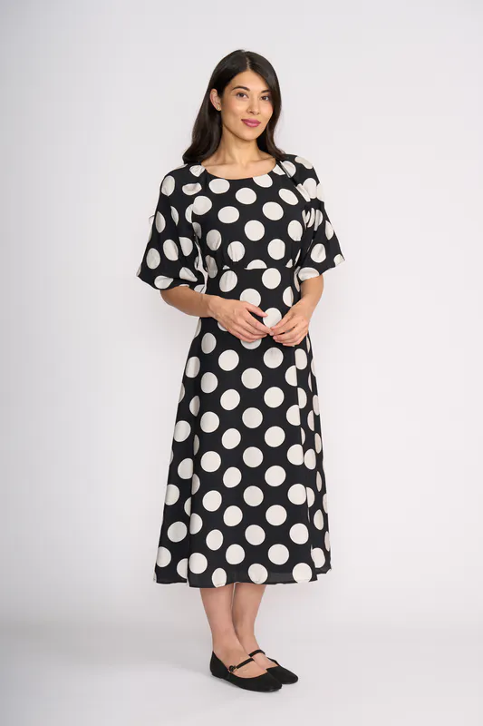Model wearing Spot Raglan Sleeve Maxi Dress By Oh Three Available at Beetees Nelson