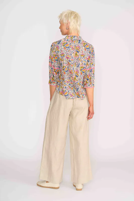 Model wearing Denim Floral Trim Insert Blouse By Foil Available at Beetees Nelson