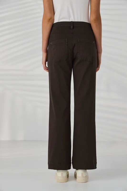 Model wearing Cocoa Chrome Jean By Lania Available at Beetees Nelson