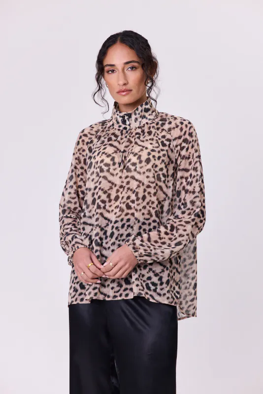 Model wearing Animal Print Bowie Blouse By Navy & Co. Available at Beetees Nelson
