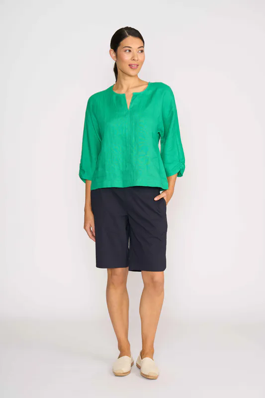 Model wearing Green Plot Twist Top By Foil Available at Beetees Nelson
