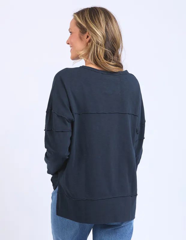 Model wearing Navy Janye Throw On Top By Foxwood Available at Beetees Nelson