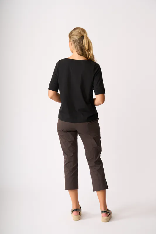 Model wearing Black V Neck Elbow Sleeve Top By Esplanade Available at Beetees Nelson