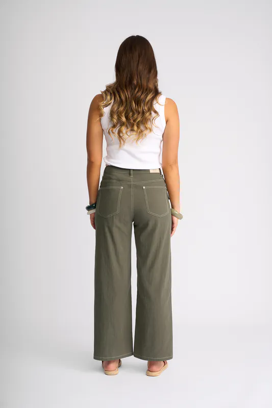 Model wearing Olive Shade Pant By Knewe Available at Beetees Nelson