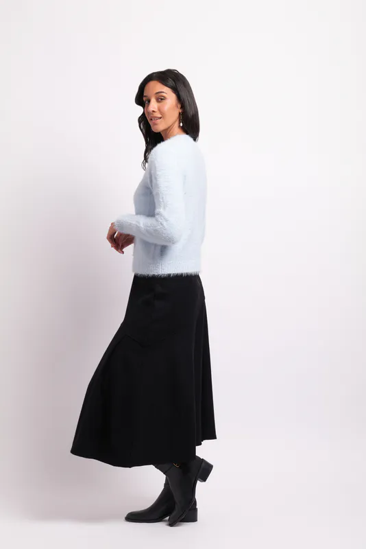 Model wearing Powder Blue Fluffy Scoop Cardigan By Foil Available at Beetees Nelson