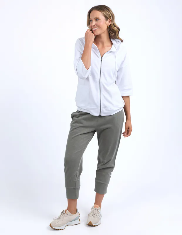 Model wearing White Beachy Zip Hoodie By Elm Available at Beetees Nelson