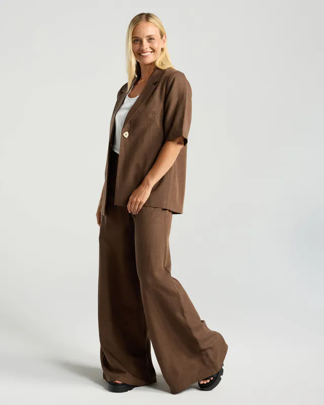 Model wearing Chocolate Francesca Linen Blazer By Blackstone Available at Beetees Nelson