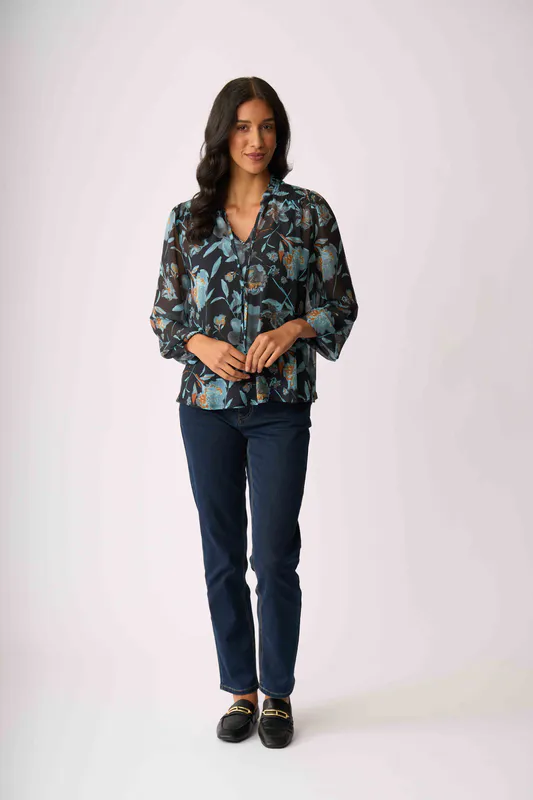 Model wearing Dreamy Floral Shirred Yoke Blouse By Memo Available at Beetees Nelson