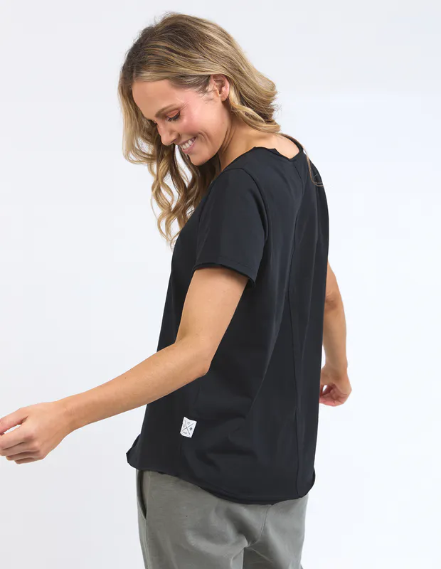 Model wearing Black Pima Vee Tee By Elm Available at Beetees Nelson