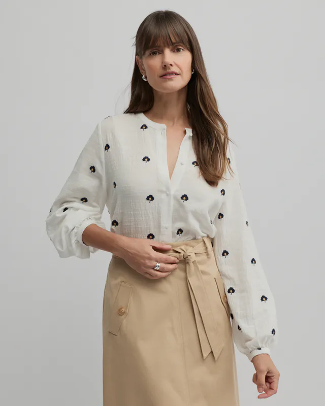 Model wearing Ecru Queens Shirt By Yarra Trail Available at Beetees Nelson