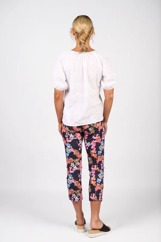 Model wearing White Check Plain V Neck Top with Floaty Sleeve By Vassalli Available at Beetees Nelson