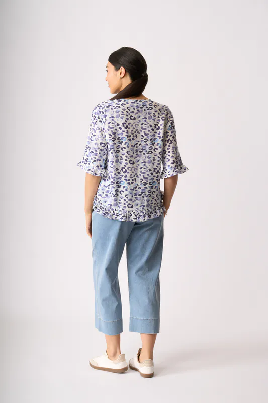 Model wearing Game on Scoop Hem Top By Foil Available at Beeteees Nelson