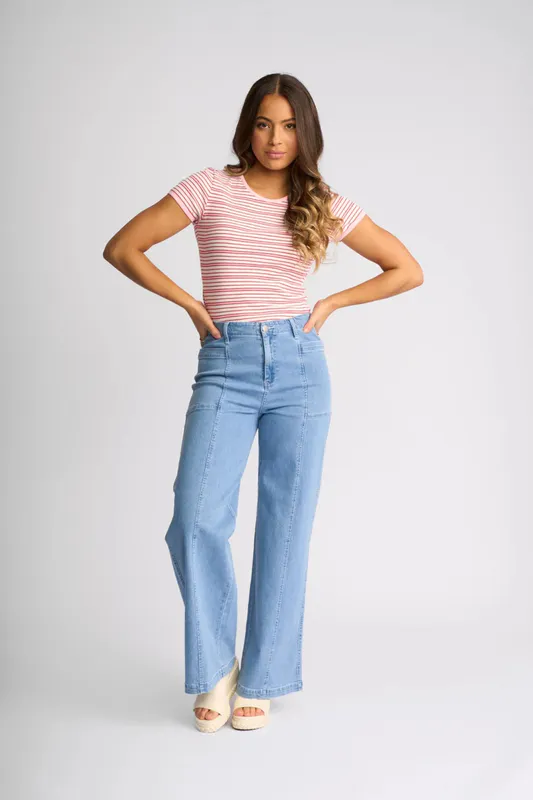 Model wearing Sky Denim Vale Jean By Knewe Available at Beetees Nelson