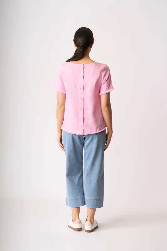 Model wearing Pink Benefits Galore Top By Foil Available at Beetees Nelson