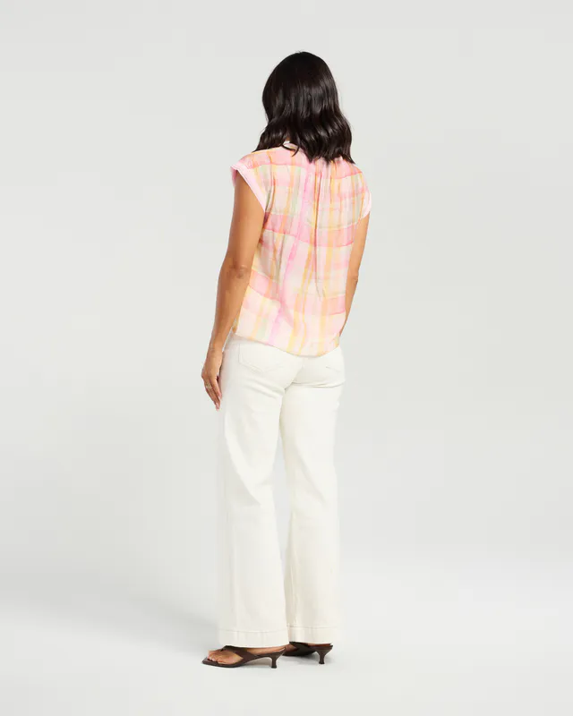 Model wearing Sunset Blush Sallie Top By NMBR Rose Available at Beetees Nelson